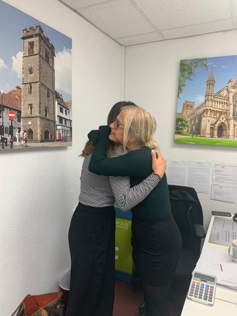 Tash and Georgia give a hug