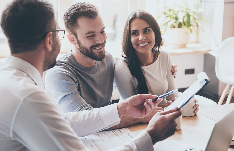 Three people having a meeting