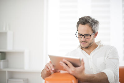 Someone reading on a tablet