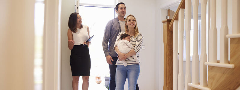 Family looking at a home