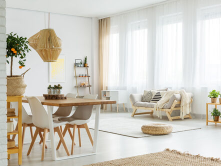 Modern interior with white brick wall and wooden elements 